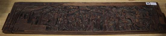 A Chinese carved hardwood figural panel length 122cm